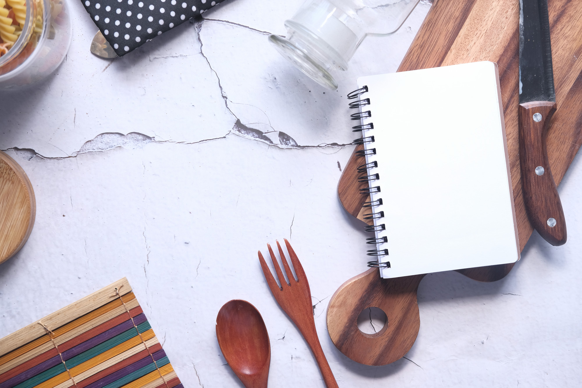 flatlay of culinary tools and notes